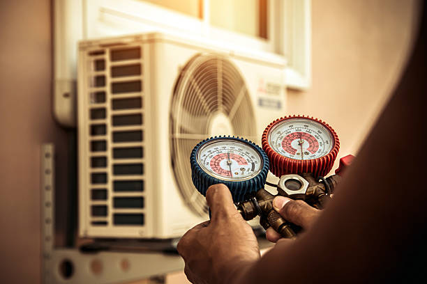 Professional Air Conditioning Service technician working in Kernersville, NC